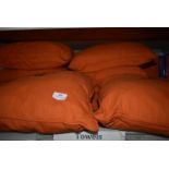 *Eight Orange Scatter Cushions