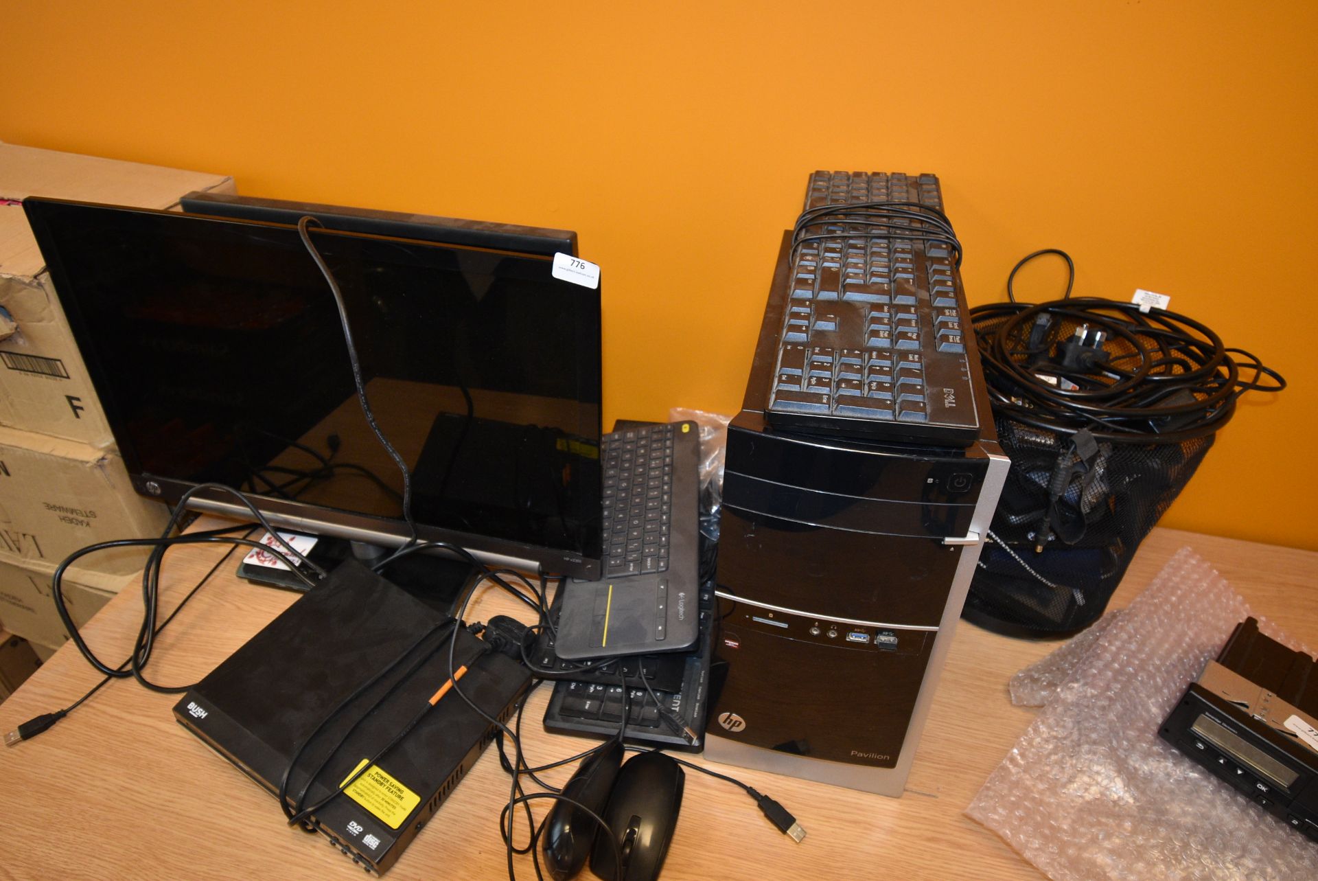 *Assorted Computer and IT Equipment Including Two Monitors, Tower, Keyboards, Power Supplies, etc.