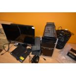 *Assorted Computer and IT Equipment Including Two Monitors, Tower, Keyboards, Power Supplies, etc.