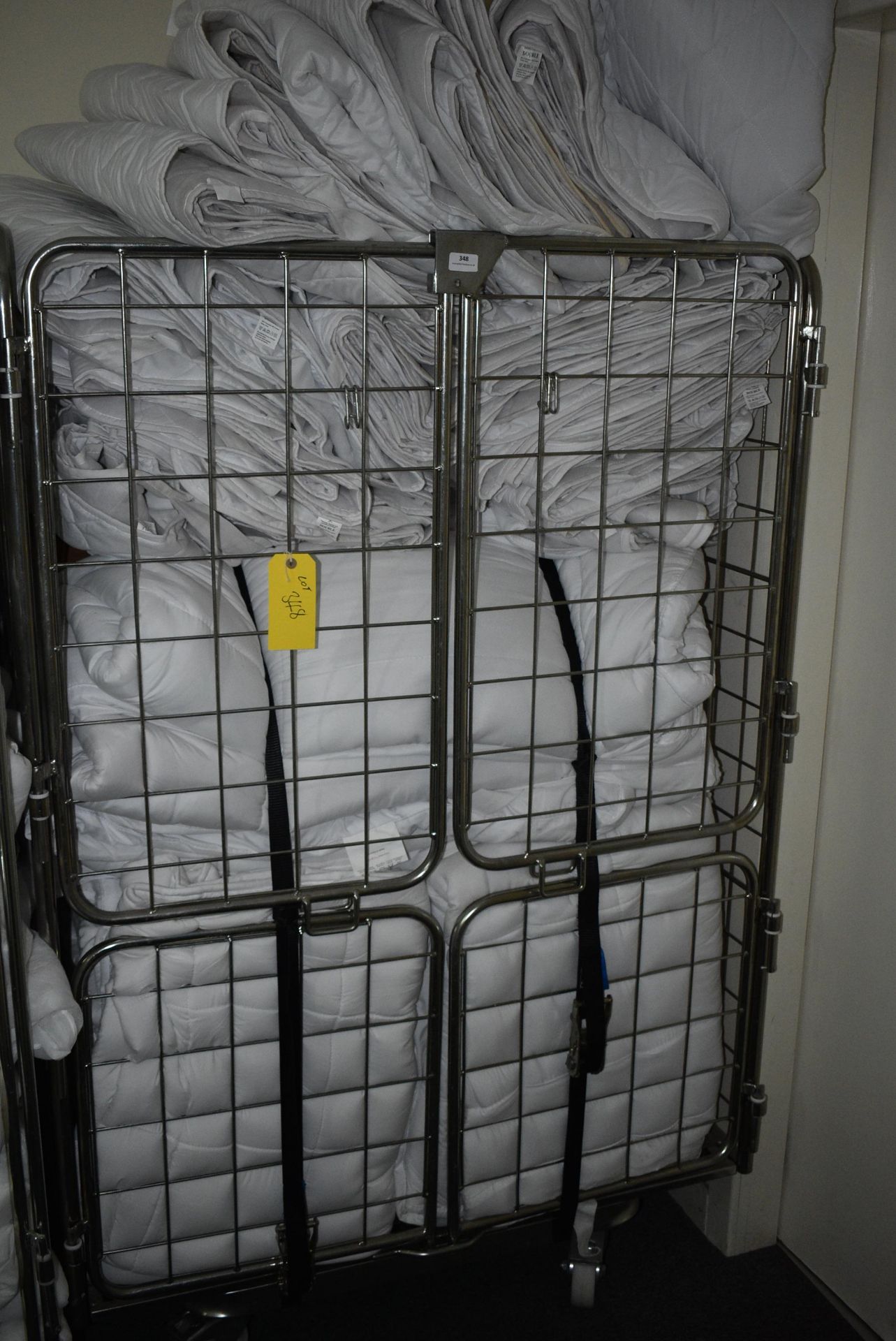 *Four Wheel Commercial Laundry Trolley Containing Double Mattress Protectors and Duvets
