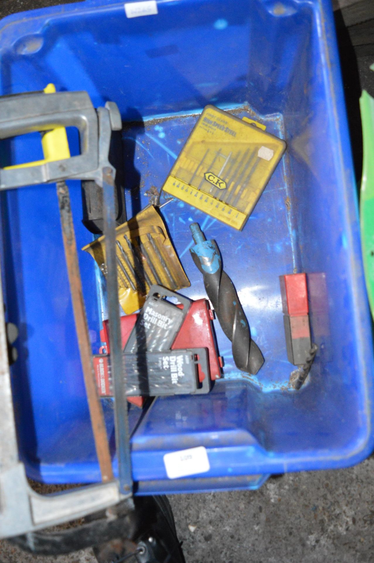 Box of Assorted Drills and Two Hacksaws