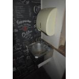 Stainless Steel Wash Hand Basin and a Paper Towel Dispenser