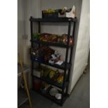 Five Tier Plastic Storage Rack Containing Assorted Herbs and Spices