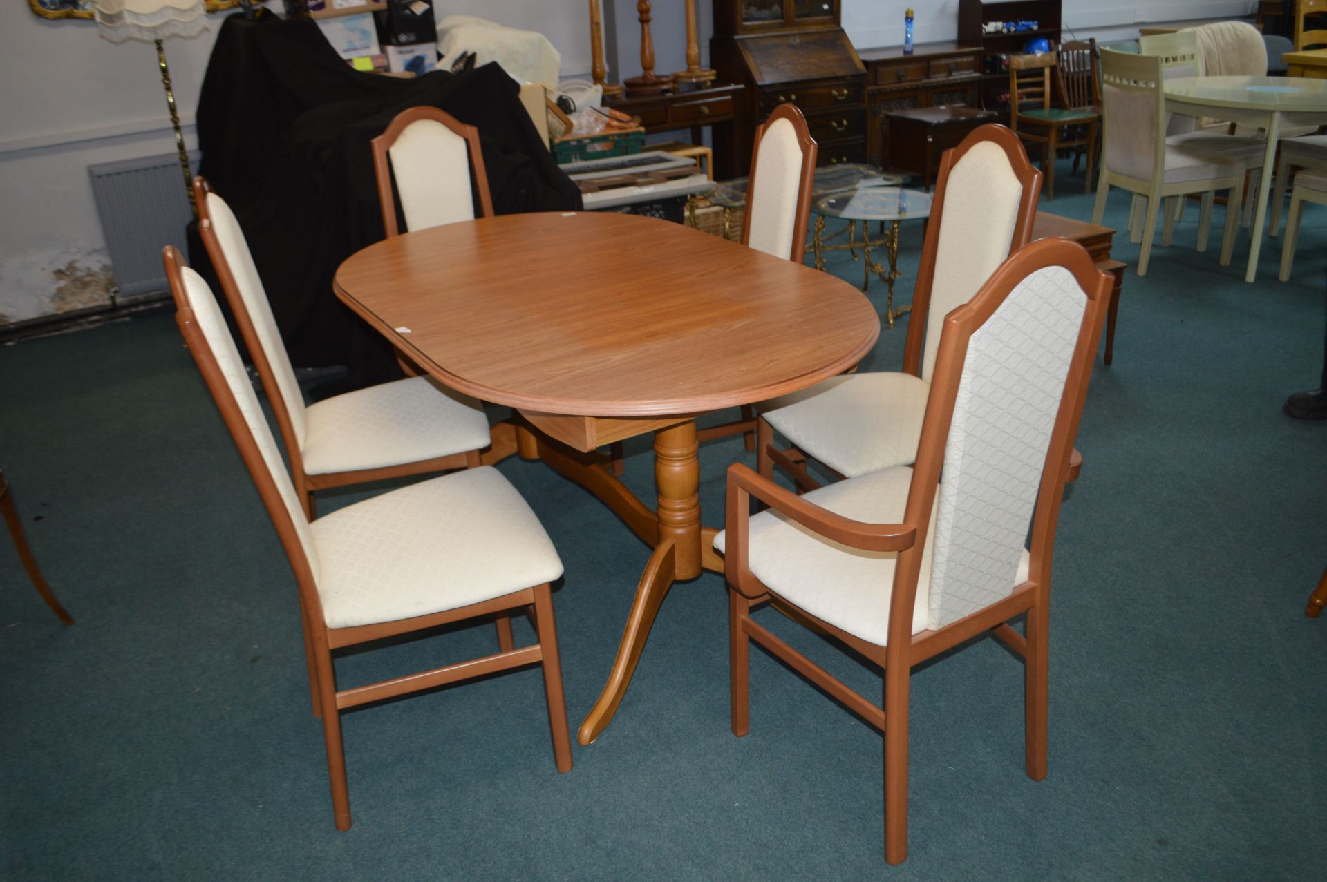 Extending Oval Dining Table with Six Matching Chai