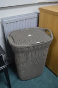 Grey Plastic Laundry Bin and Contents