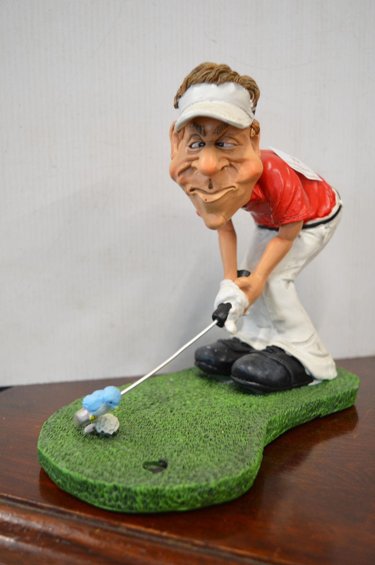Humorous Golfing Figure