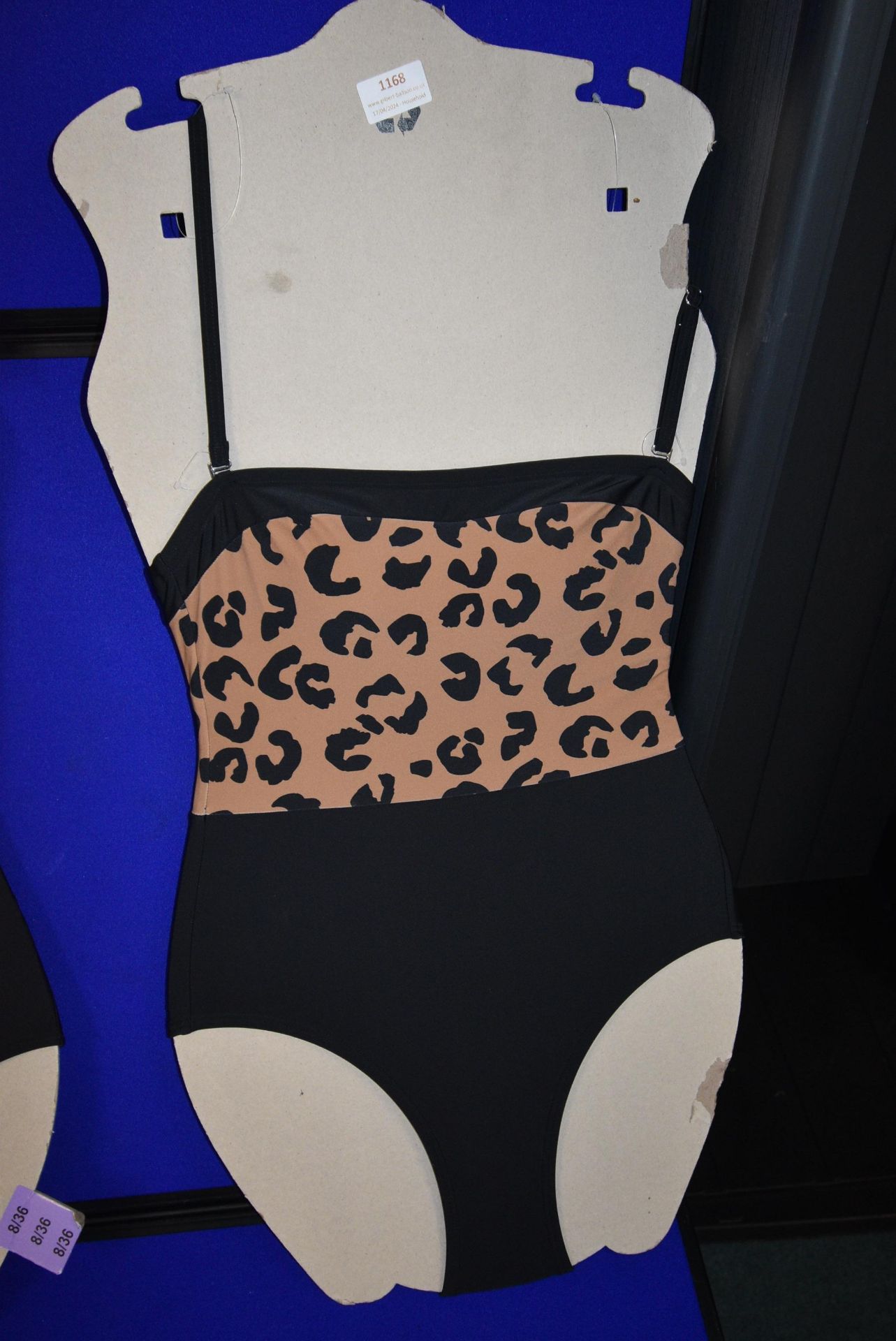*DKNY Lady’s Leopard Skin Swimsuit Size: 8