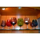 Seven Coloured Glass Goblets
