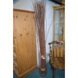 Tall Glass Vase Containing Willow Branches