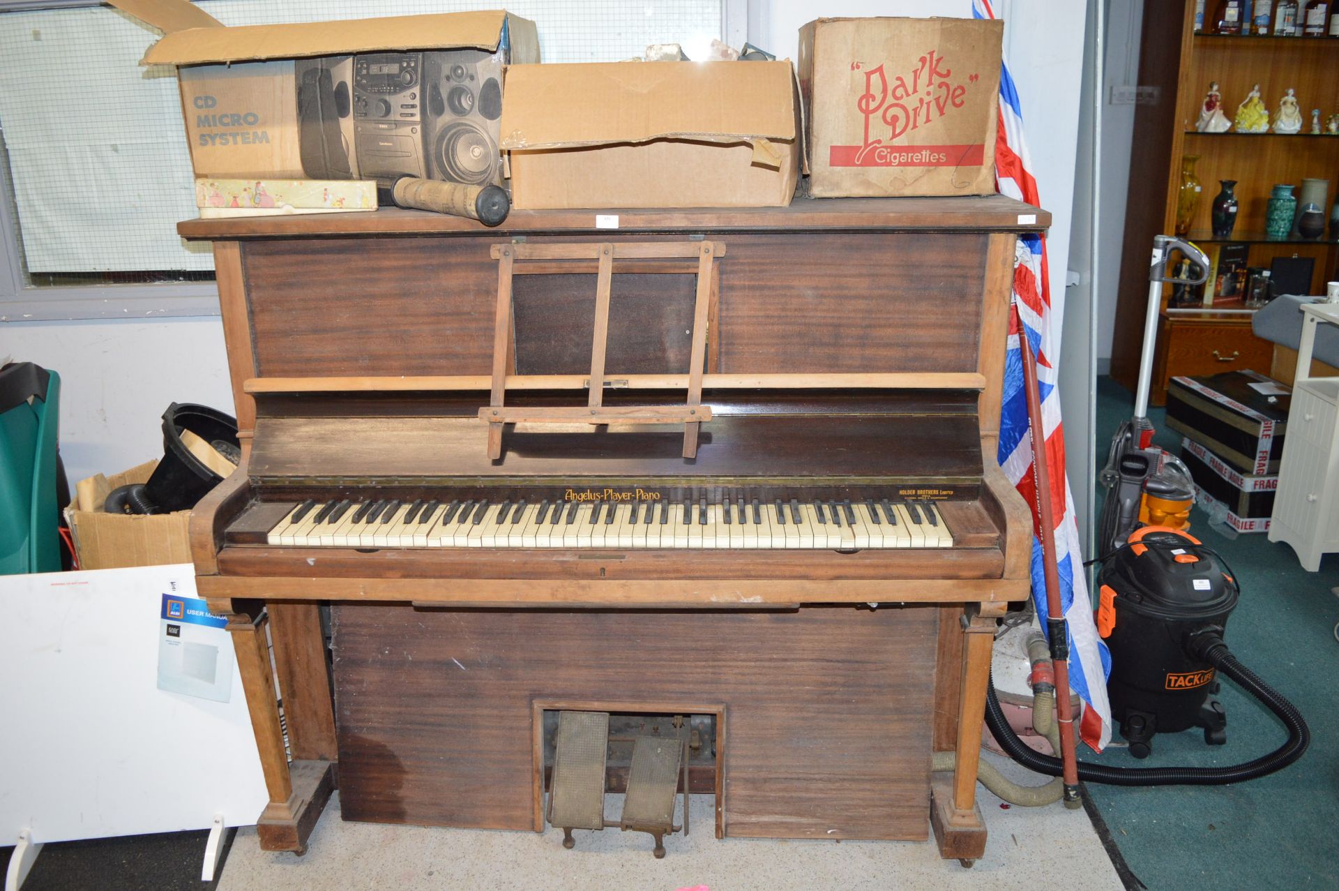 Angelus Player Piano and a Quantity of Piano Rolls