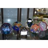 Six Glass Paperweights Including Caithness, and Se