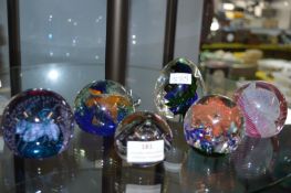 Six Glass Paperweights Including Caithness, and Se