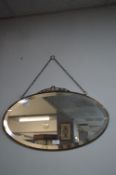 Oval Brass Framed Beveled Edge Mirror