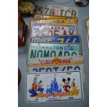 Nine Metal American Car Registration Plates