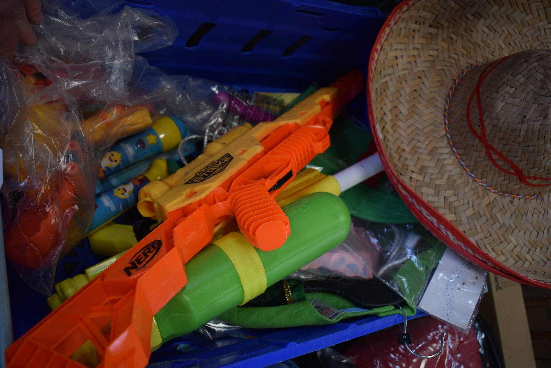 Various Play Items Including Water Guns, Baby Shark Microphone, Puzzles, etc. (basket not included)