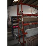 Eight Pole Carpet Rack with Turning Handles, and Castors 4.5m long x 2.2m tall (contents not