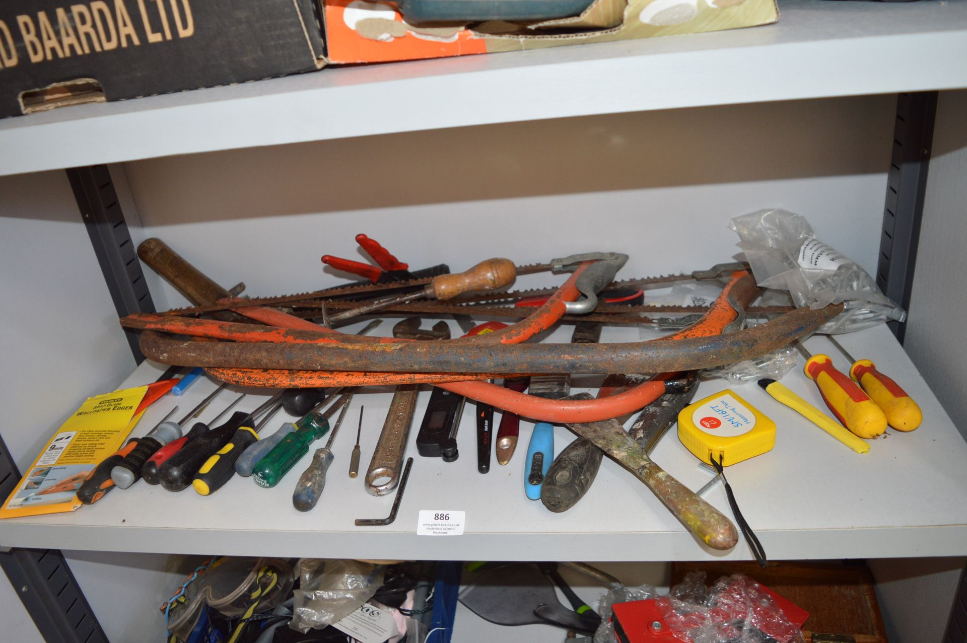 Contents of Shelf to Include Screwdrivers, Spanners, Bow Saws, etc.
