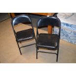Two Black Folding Steel Chairs