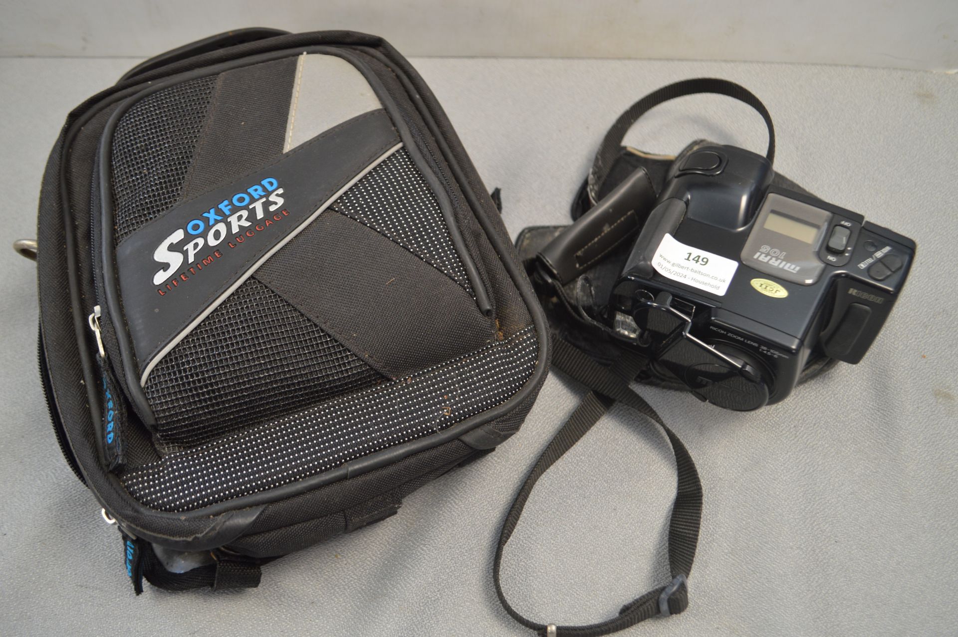 Ricoh Mirai 105 Camera, and a Oxford Sports Motorb