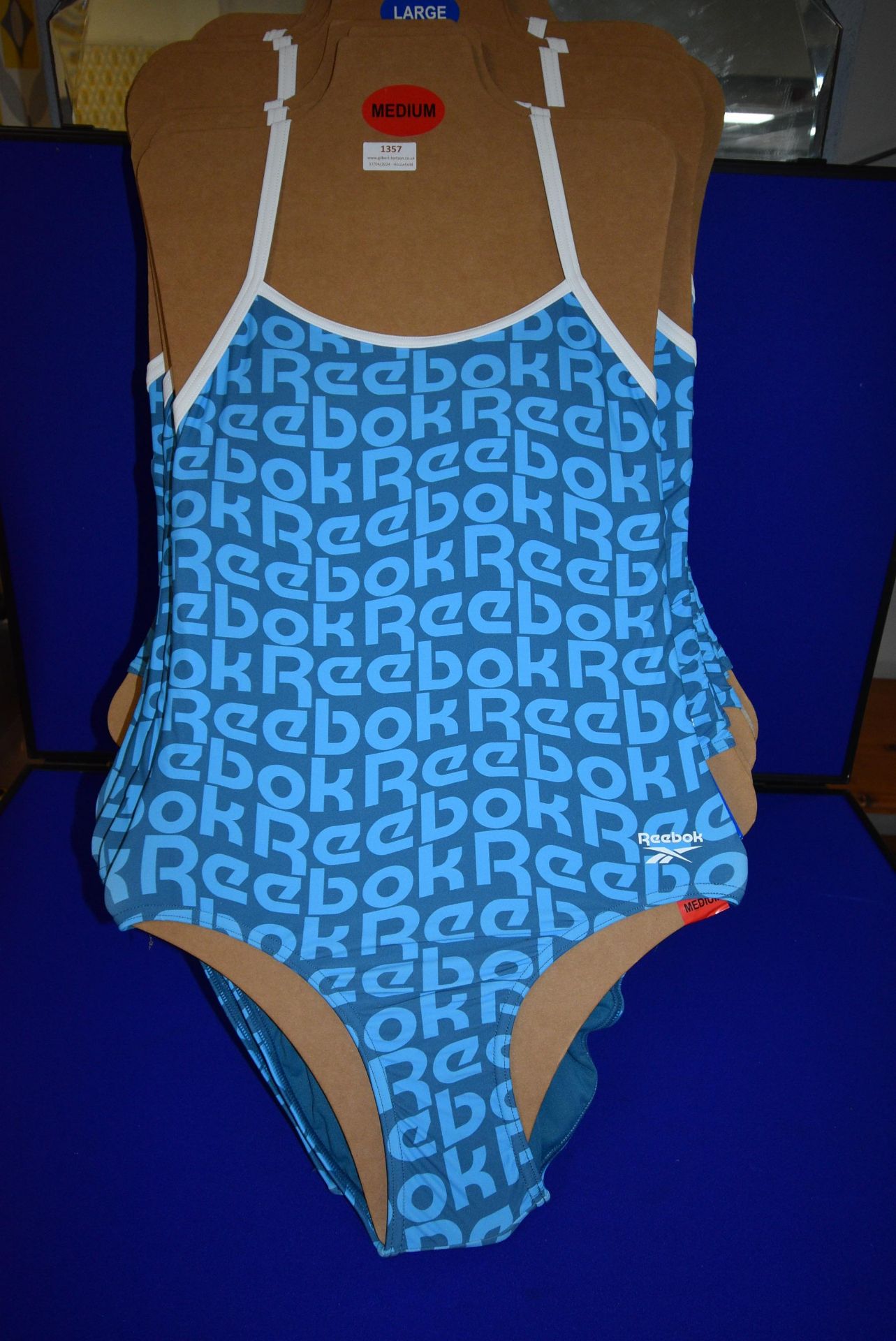 *Reebok Lady’s Blue Swimsuit Size: M
