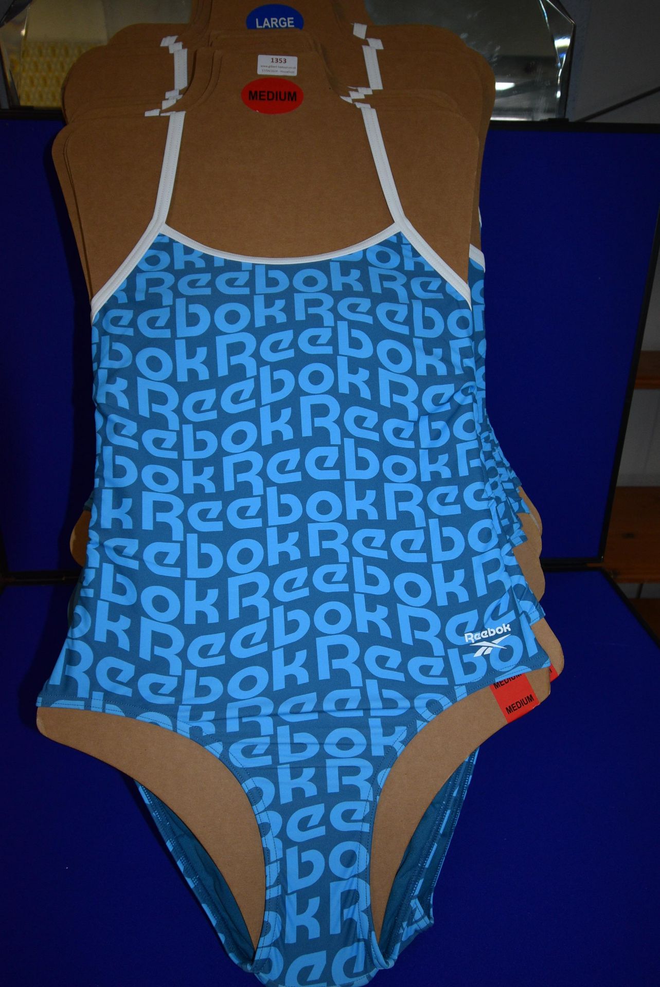 *Reebok Lady’s Blue Swimsuit Size: M