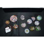 Twelve Small Glass Paperweight