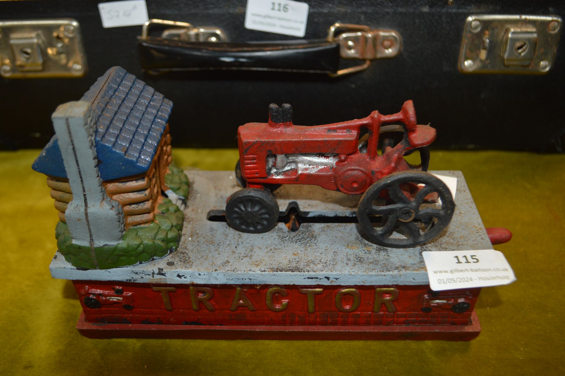 Reproduction Cast Iron Moneybox with Tractor Desig