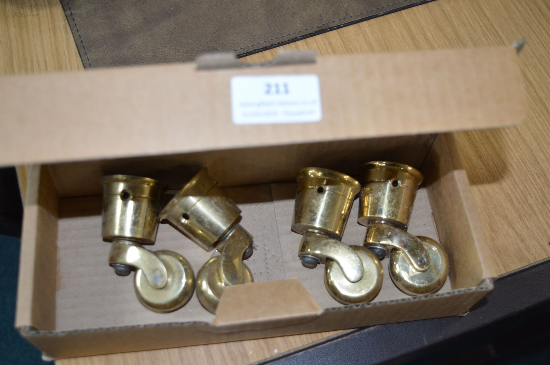 Four Brass Furniture Castors