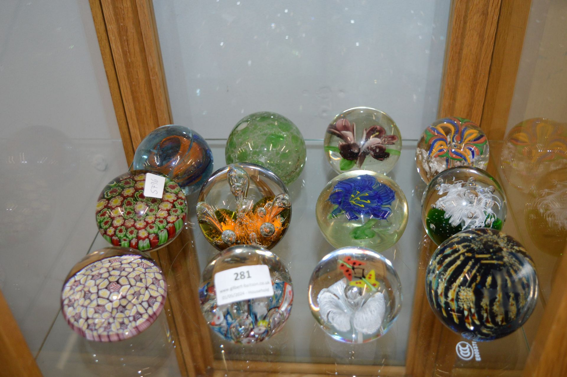 Twelve Glass paperweights Including Medina and Web