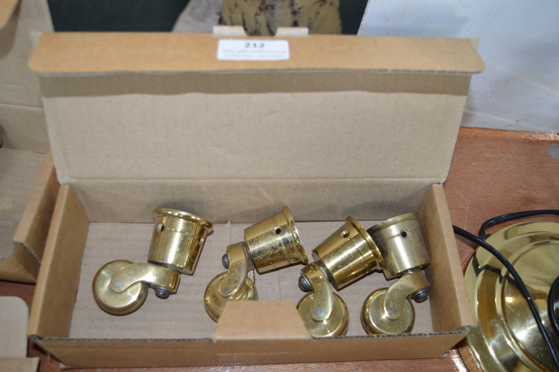 Four Brass Furniture Castors