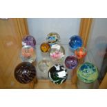 Twelve Glass paperweights Including Medina and Cai