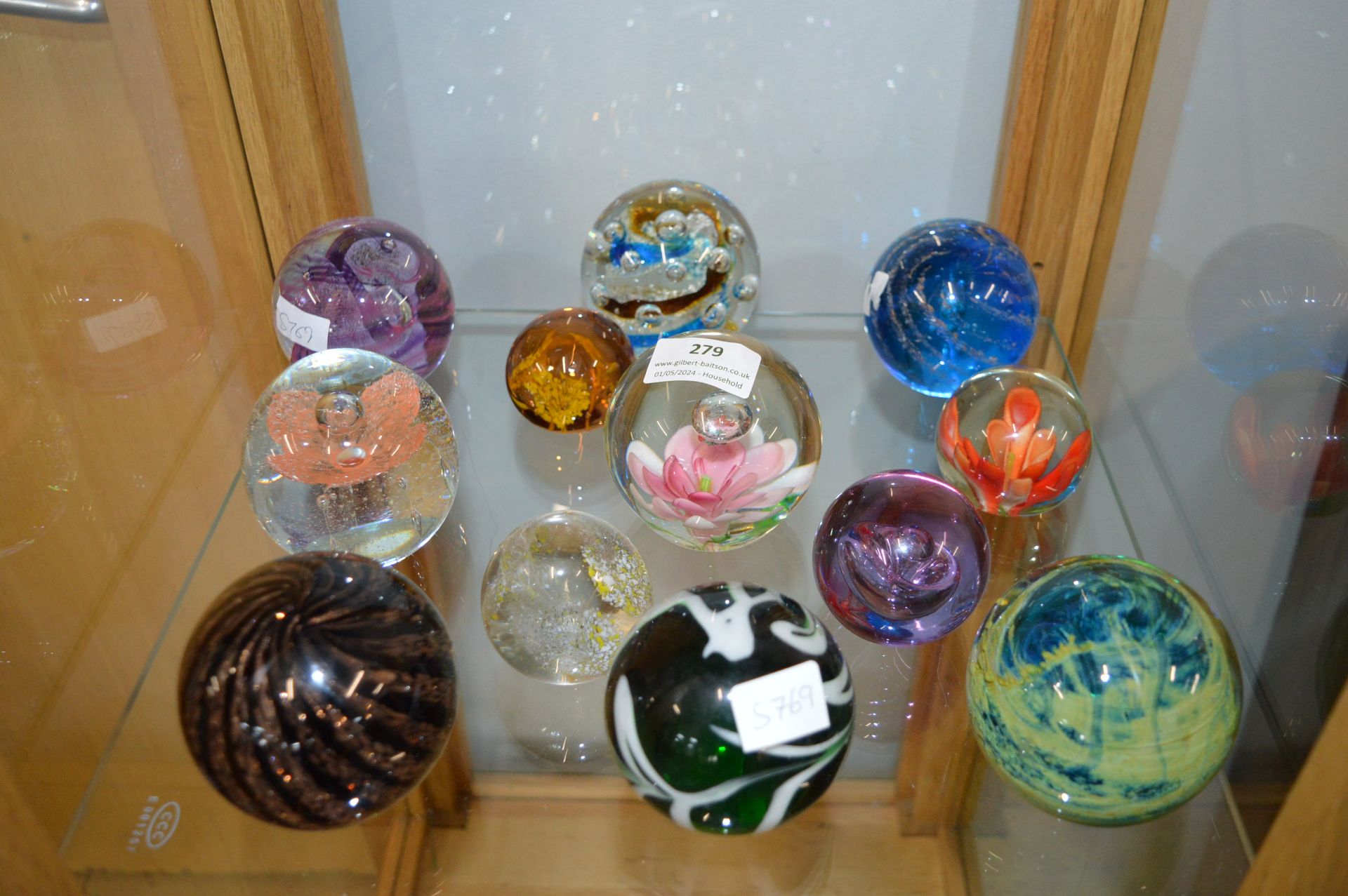 Twelve Glass paperweights Including Medina and Cai