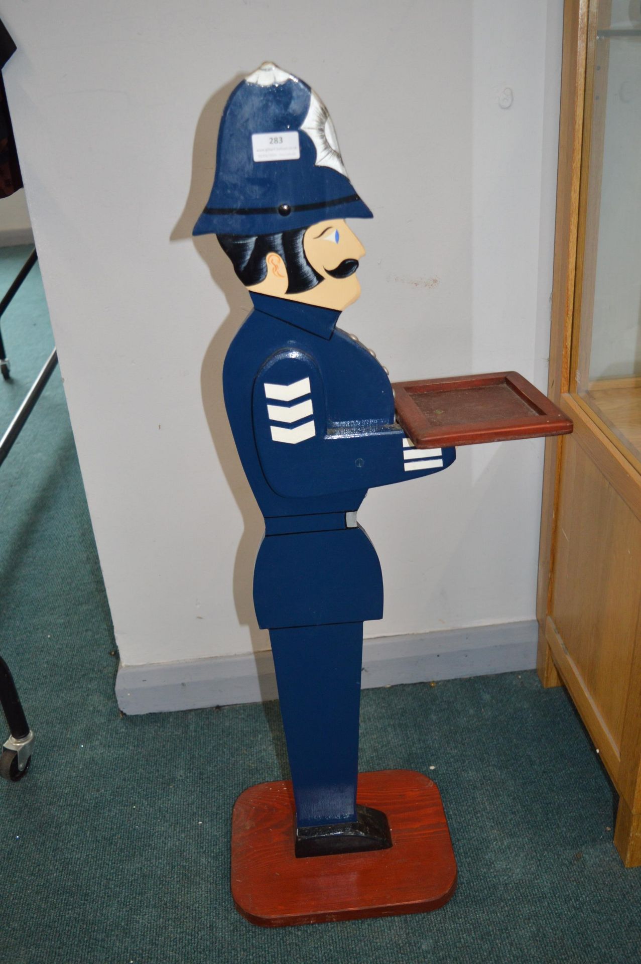 Painted Policeman Serving Stand