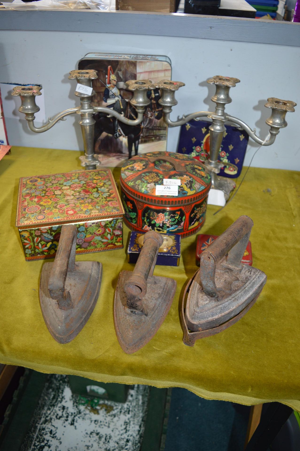 Vintage Tins, Candelabra, and Flat Irons