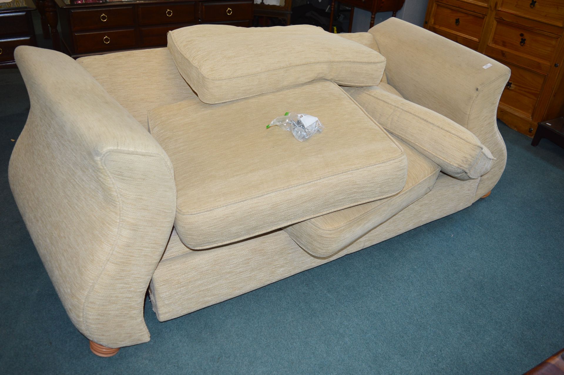 Cream Upholstered Two Seat Sofa Bed