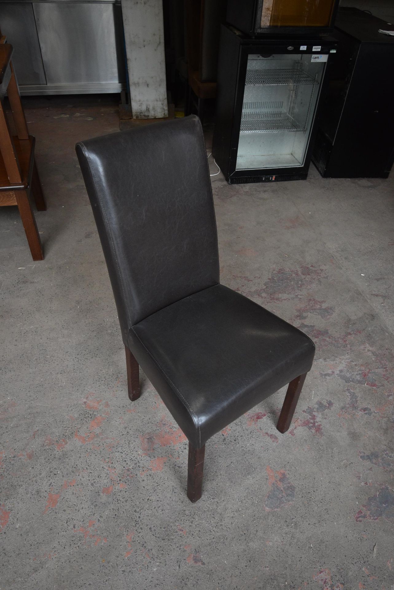 Four Brown Leatherette Chairs