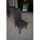 Four Brown Leatherette Chairs