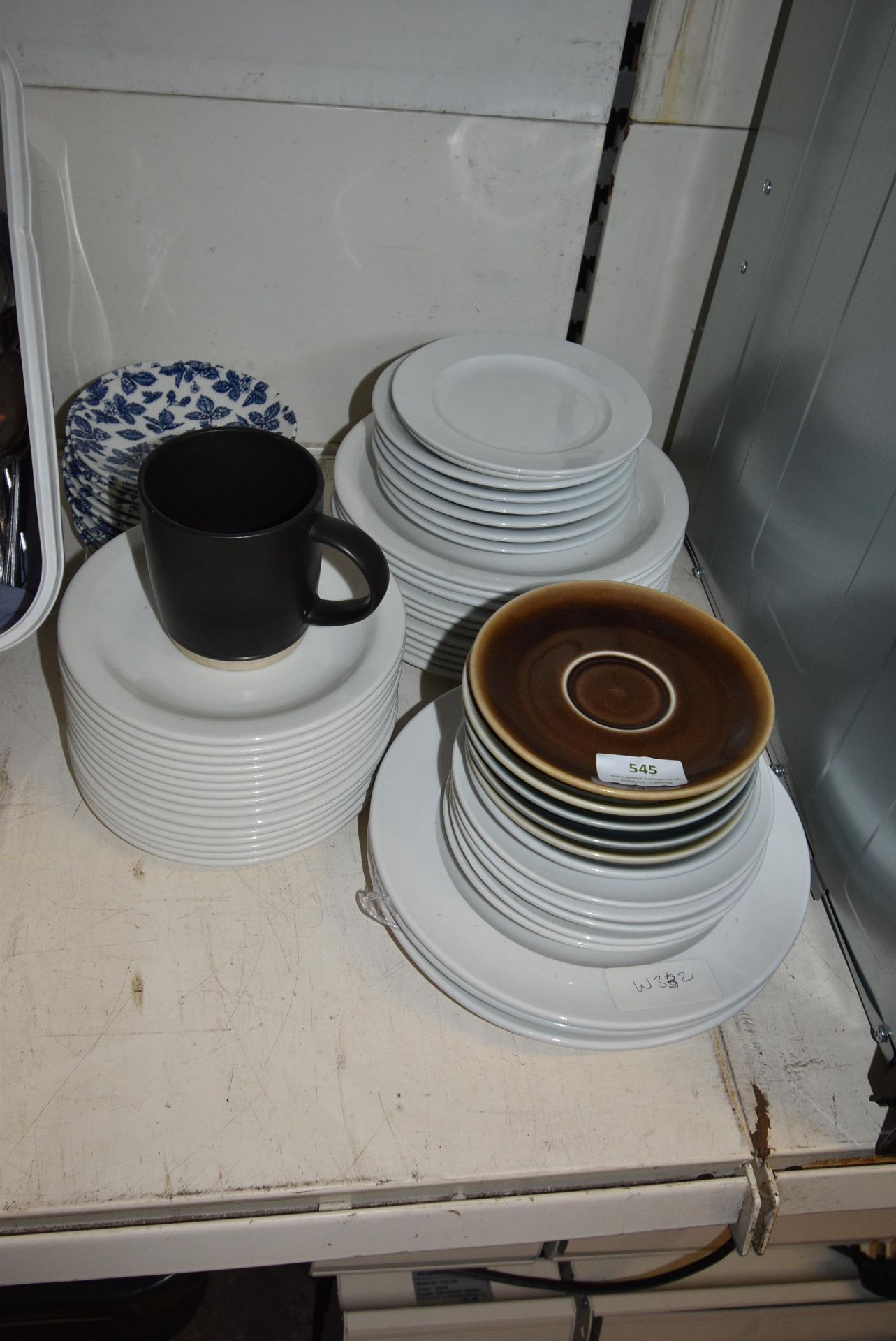 Assortment of Plates and Saucers