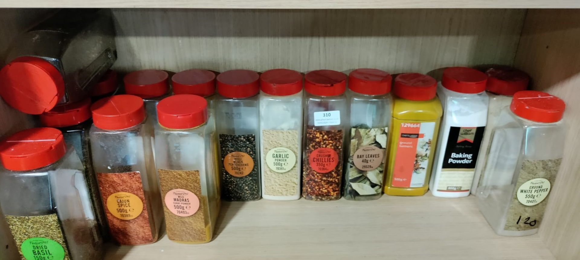 Contents of Shelf to Include Dried basil, Garlic Powder, Crushed Chillies, Bay Leaves, etc.