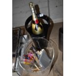 Black Display Champagne Bucket with Display Bottle, and Clear Bucket with Contents