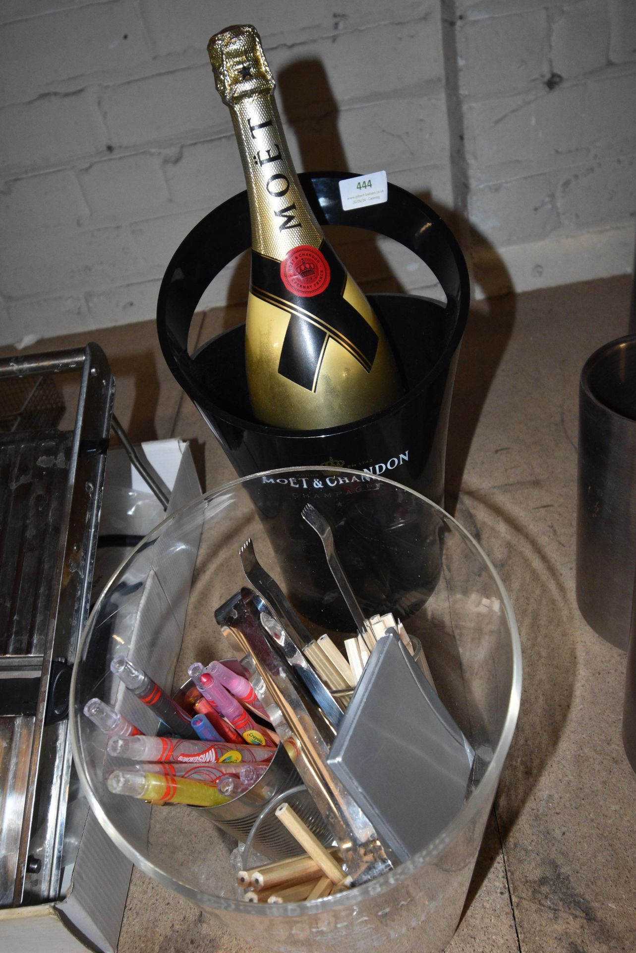 Black Display Champagne Bucket with Display Bottle, and Clear Bucket with Contents