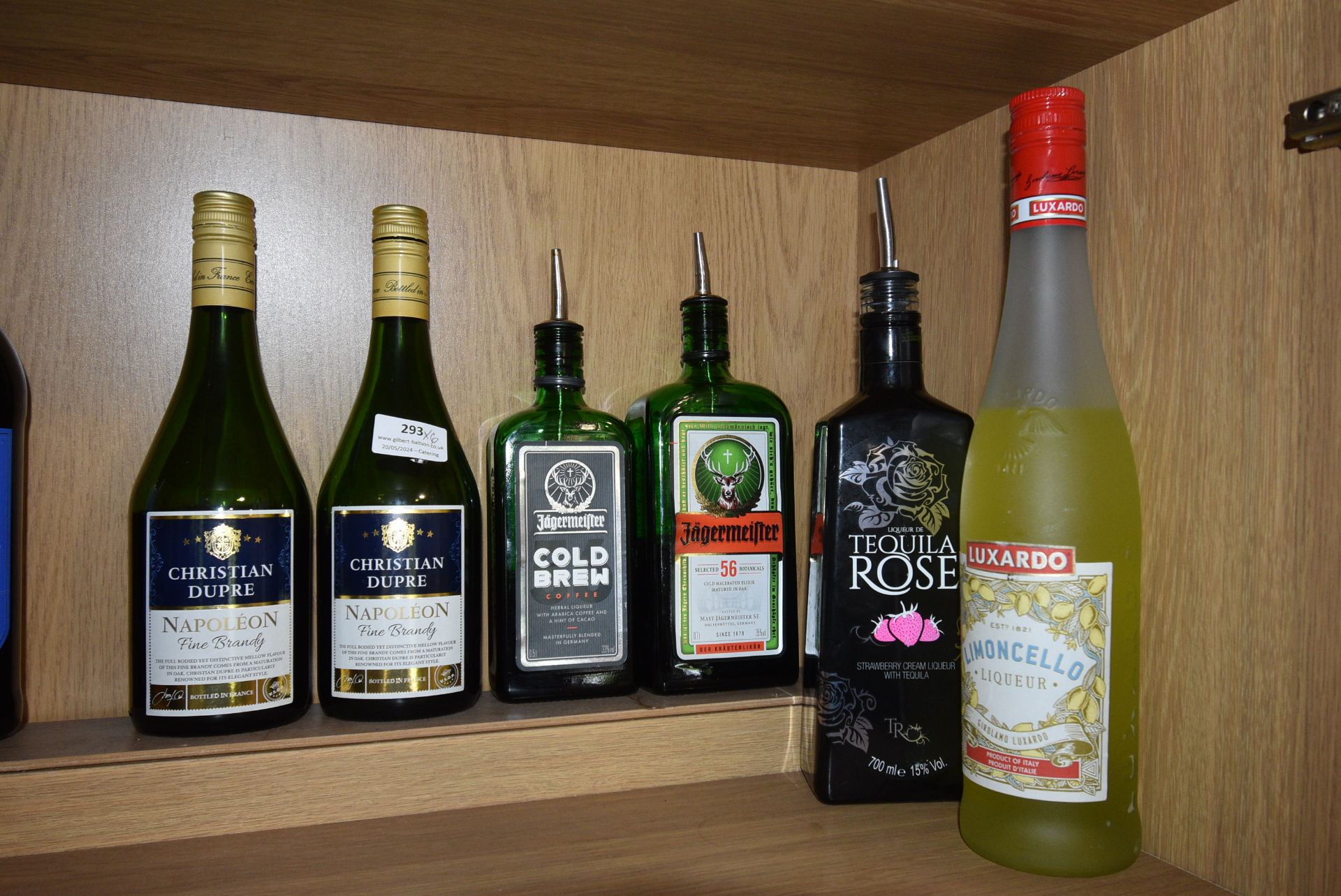 Six Assorted Open Bottles of Alcohol