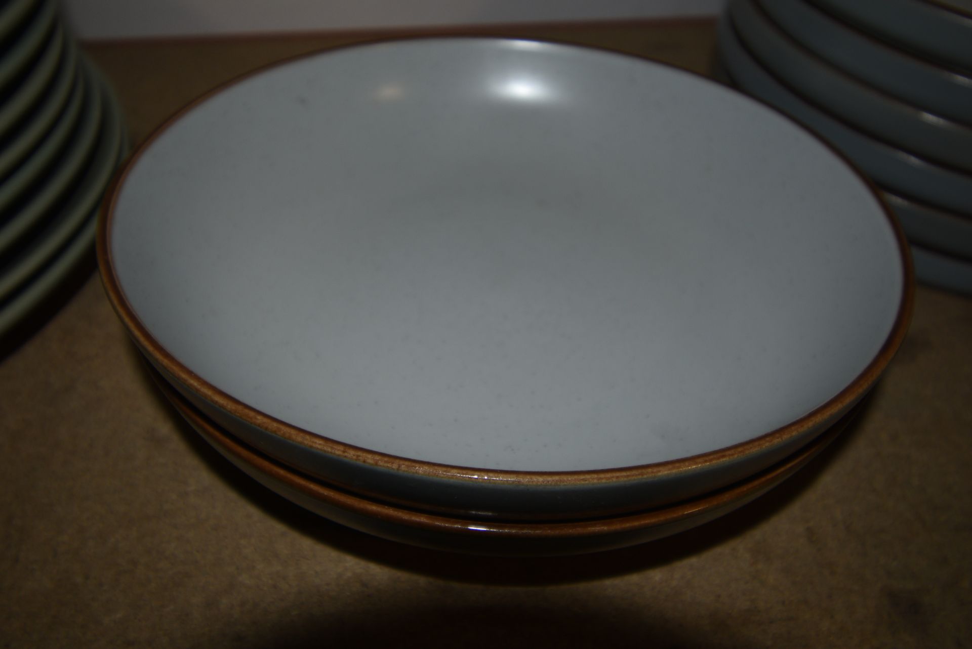 Four Habitat Circular Plates and Two Bowls