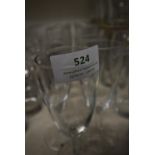 Seventeen Unbranded Flute Glasses