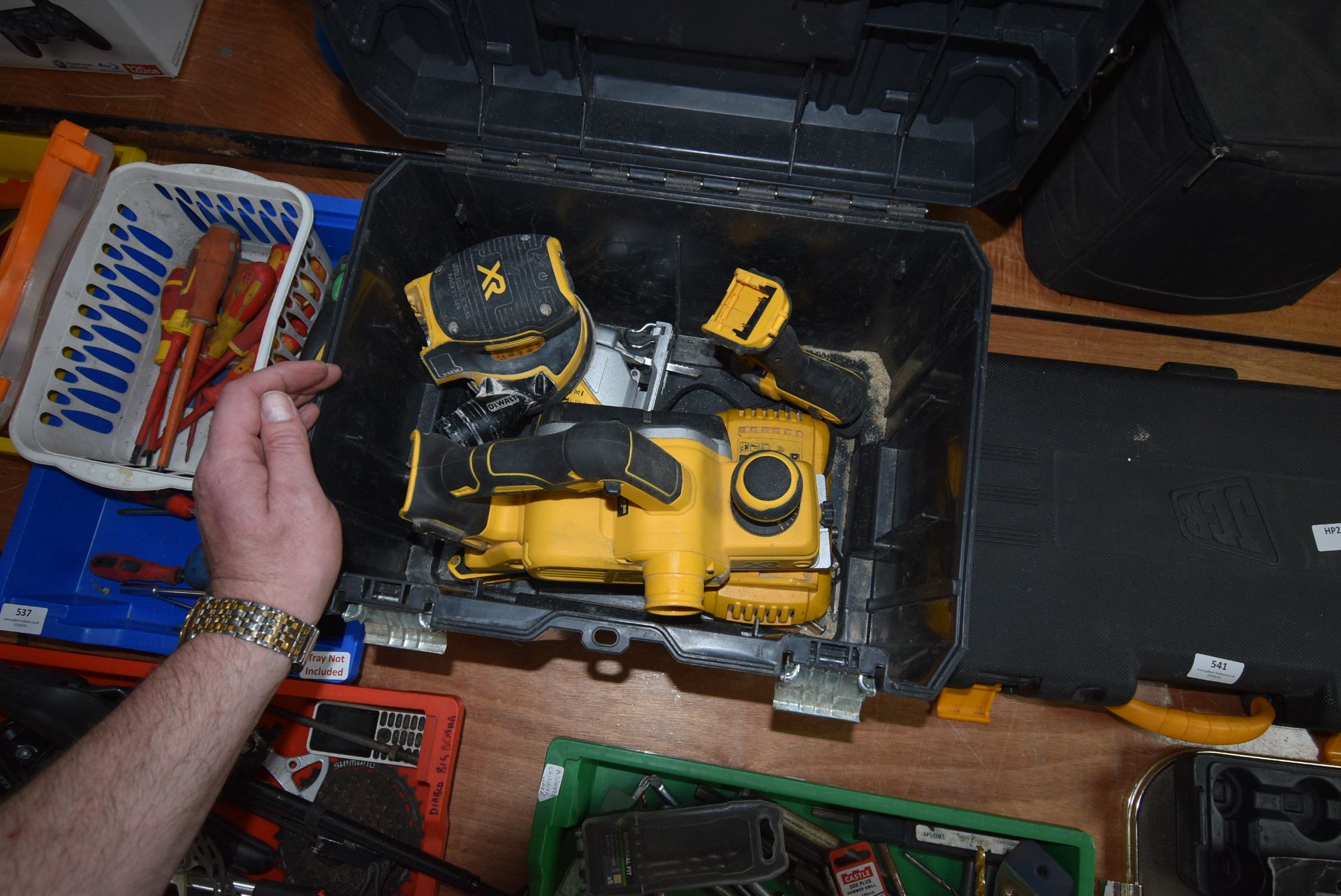 Four Dewalt Battery Operated Tools: Jig Saw, Palm Sander, Driver, and Planer (no batteries) with