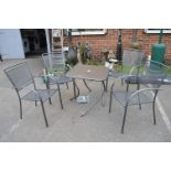 *Four Stacking Garden Chairs plus a Table