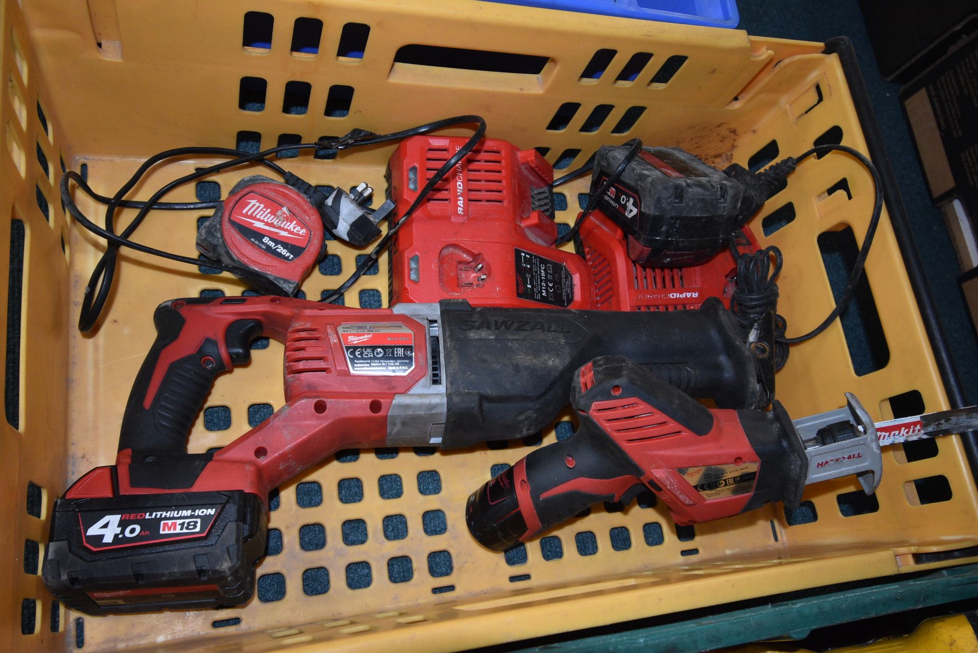 Milwaukee M18BSX Reciprocating Saw, and a Milwaukee C12HZ Mini Hacksaw with Two Chargers and Two