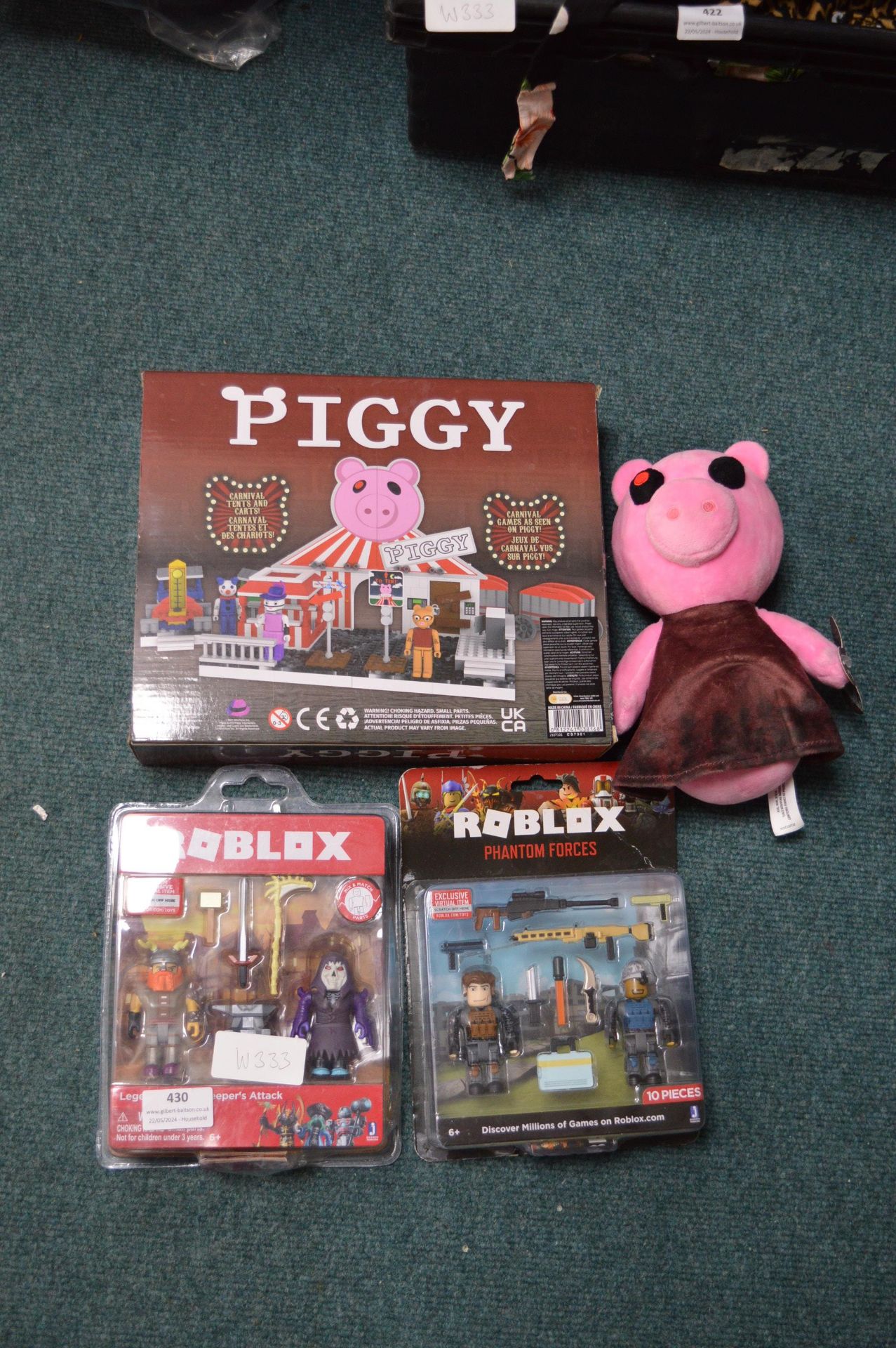 Four Toys Including Piggy Carnival and Two Roblox