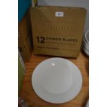 *Nine White Porcelain Dinner Plates