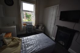 *Contents of Room 6 to Include Single Divan, Pine Bedside Cabinet, Commode Chair, Tub Seat, and a